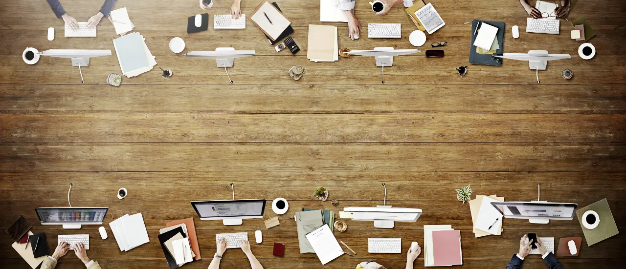 A group of businesspeople who are busy scaling their business.