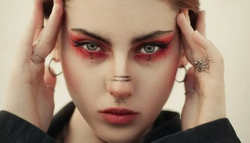 A business woman thinking about breaking free of business burnout.